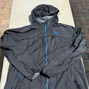 Under Armour Men’s Black Hooded waterproof Jacket with Blue Trim size XL